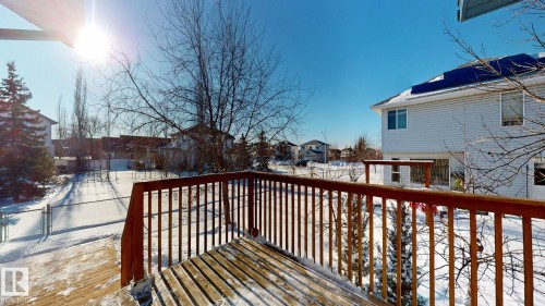 Snow covered deck featuring a residential view - 17010 84 Street, Edmonton, AB - Outdoor