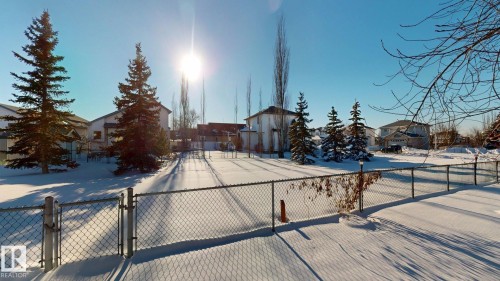 View of front of property with a residential view and a gate - 17010 84 Street, Edmonton, AB - Outdoor