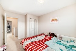 Bedroom featuring carpet floors and a closet - 