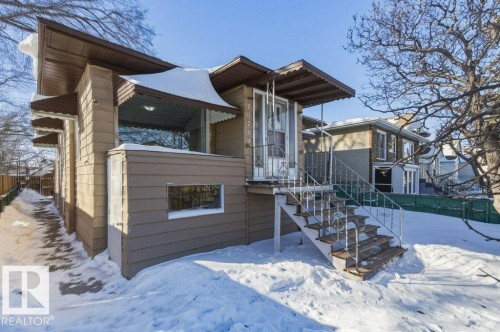 View of front facade featuring stairway - 10704 96 St Nw, Edmonton, AB - Outdoor