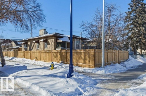 View of snowy exterior with a chimney - 10704 96 St Nw, Edmonton, AB - Outdoor