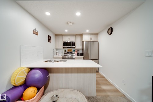 2838 152 Avenue, Edmonton, AB - Indoor Photo Showing Kitchen With Stainless Steel Kitchen With Double Sink