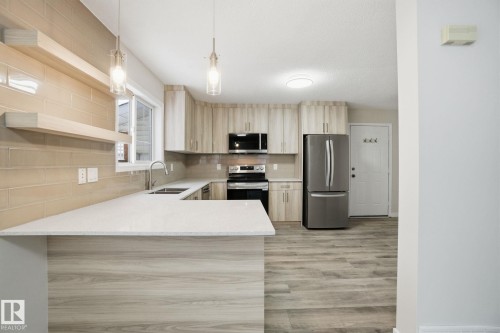 4035 38 Street, Edmonton, AB - Indoor Photo Showing Kitchen With Stainless Steel Kitchen With Double Sink