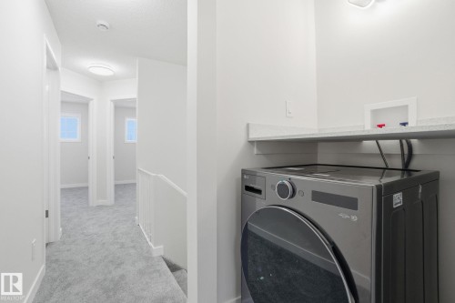 4035 38 Street, Edmonton, AB - Indoor Photo Showing Laundry Room