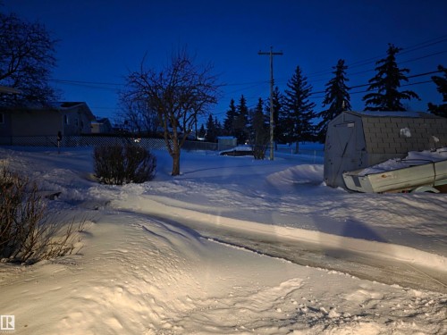 View of snowy yard - 4400 45 Avenue, Stony Plain, AB - Outdoor With View