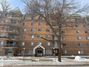 Snow covered property featuring a view of apartment building / complex - 605 8728 Gateway Boulevard, Edmonton, AB  - Outdoor With Facade 