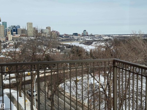 Snow covered back of property with a view of city - 605 8728 Gateway Boulevard, Edmonton, AB - Outdoor With View
