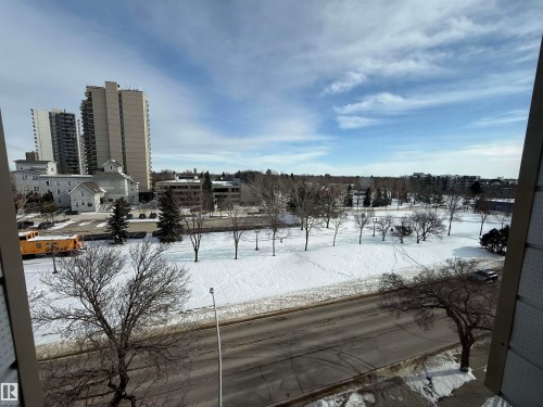 View of yard covered in snow - 605 8728 Gateway Boulevard, Edmonton, AB - Outdoor With View