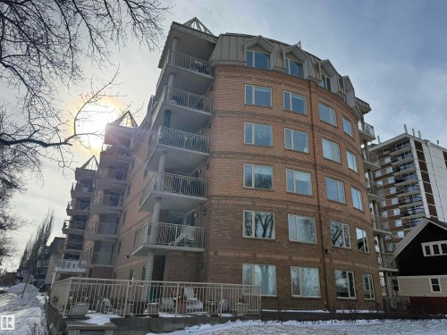 Snow covered property with a view of apartment building / complex - 605 8728 Gateway Boulevard, Edmonton, AB - Outdoor With Facade