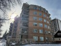 Snow covered property with a view of apartment building / complex - 605 8728 Gateway Boulevard, Edmonton, AB  - Outdoor With Facade 