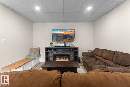315 Waterton Way, Cold Lake, AB - Indoor Photo Showing Living Room With Fireplace