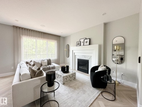 17427 7 Street, Edmonton, AB - Indoor Photo Showing Living Room With Fireplace