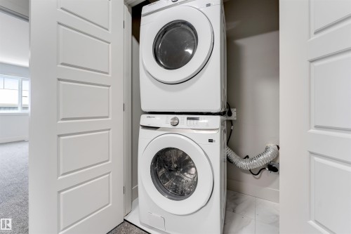 4371 37 Street, Beaumont, AB - Indoor Photo Showing Laundry Room