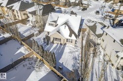 Snowy aerial view with a residential view - 