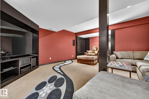 Living room featuring carpet and baseboards - 2036 Hilliard Place, Edmonton, AB - Indoor Photo Showing Living Room