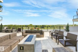 Open for residents to enjoy during warmer months there is lots of furniture for residents to use. - 