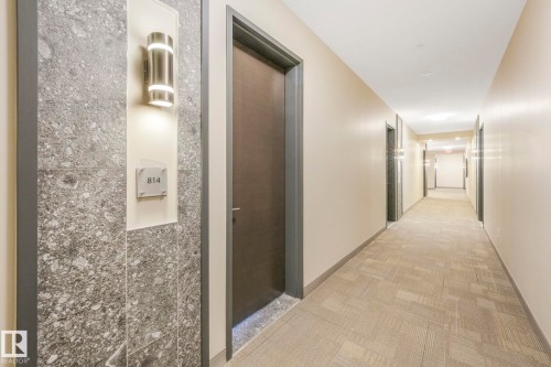 Higher ceilings and taller doors on the 8th floors. - 814 200 Bellerose Drive, St. Albert, AB - Indoor Photo Showing Other Room