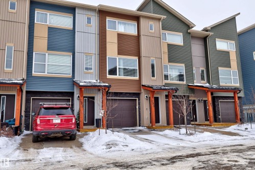 Modern home featuring a garage - 295 401 Southfork Drive, Leduc, AB - Outdoor With Facade