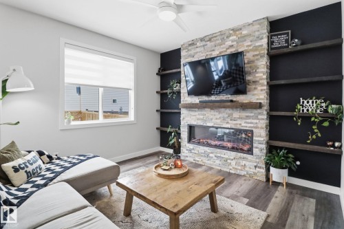 5108 Lark Crescent Nw, Edmonton, AB - Indoor Photo Showing Living Room With Fireplace