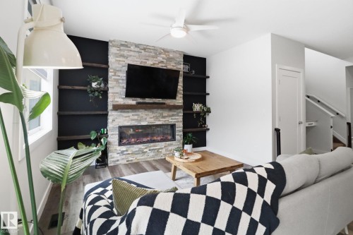 5108 Lark Crescent Nw, Edmonton, AB - Indoor Photo Showing Living Room With Fireplace