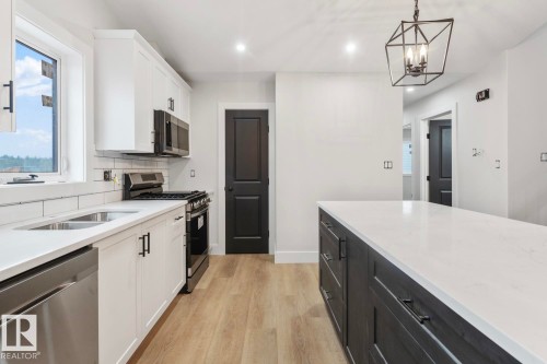 305 Fundy Way, Cold Lake, AB - Indoor Photo Showing Kitchen With Double Sink