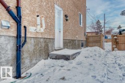 View of property exterior with a gate - 