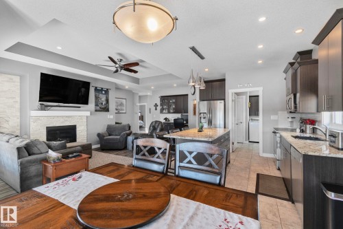 105 Houle Drive, Morinville, AB - Indoor Photo Showing Other Room With Fireplace