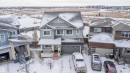 View of front of home featuring an attached garage and a residential view - 19743 26 Avenue, Edmonton, AB  - Outdoor With Facade 
