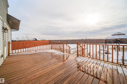 Snow covered deck with a gazebo - 19743 26 Avenue, Edmonton, AB - Outdoor With Deck Patio Veranda With Exterior