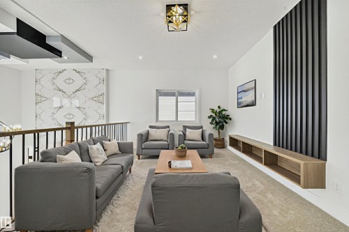 Living area with carpet - 4006 40 Street, Beaumont, AB - Indoor