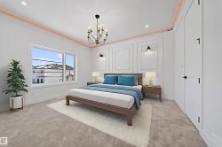 Bedroom with light carpet, suspended lighting, ornamental molding, and a decorative wall - 