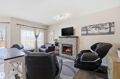 40 Becker Crescent, Fort Saskatchewan, AB - Indoor Photo Showing Living Room With Fireplace