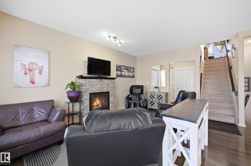 40 Becker Crescent, Fort Saskatchewan, AB - Indoor Photo Showing Living Room With Fireplace
