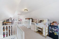 Office space with carpet floors and attic access - 