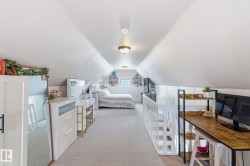 Bedroom featuring light colored carpet - 