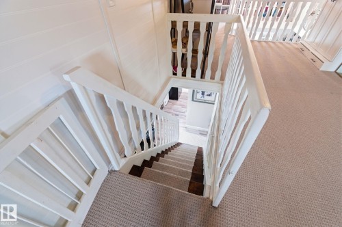 Stairs with carpet - 4919 50 Avenue, Bon Accord, AB - Indoor Photo Showing Other Room