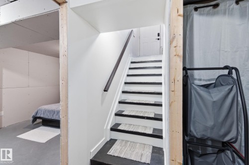 Stairway to the basement - 4919 50 Avenue, Bon Accord, AB - Indoor Photo Showing Other Room