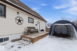 The portable carport will keep the snow off your car and is included. - 