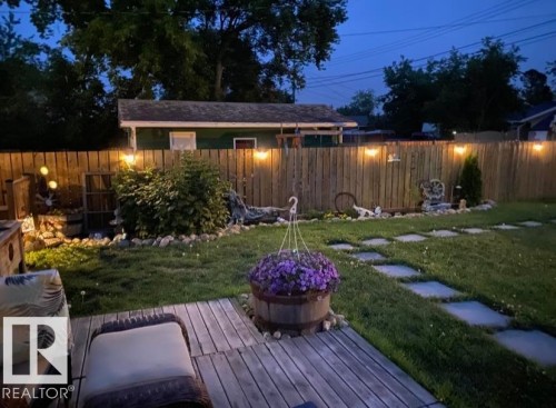 The yard is a beautiful place to enjoy warm summer evenings. - 4919 50 Avenue, Bon Accord, AB - Outdoor