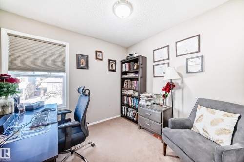 Office space featuring light carpet and a textured ceiling - 14043 151 Avenue, Edmonton, AB - Indoor Photo Showing Office