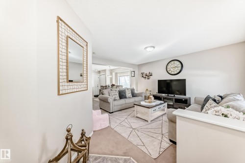 Living area with light carpet - 14043 151 Avenue, Edmonton, AB - Indoor Photo Showing Living Room