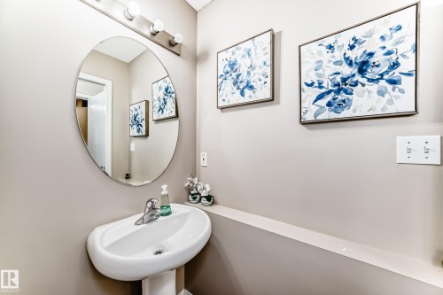 Bathroom featuring a sink - 14043 151 Avenue, Edmonton, AB - Indoor Photo Showing Bathroom