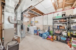 Basement with washer and dryer and water heater - 