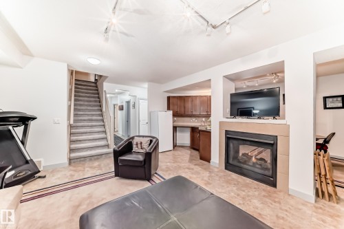 26 841 156 Street, Edmonton, AB - Indoor Photo Showing Living Room With Fireplace