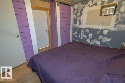 Bedroom with wood finished floors - 11126 Twp Rd 605A, Rural St. Paul County, AB - Indoor