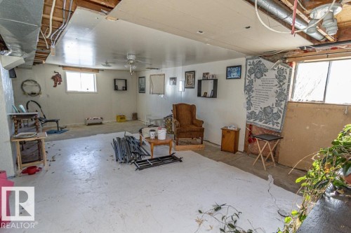 Basement featuring ceiling fan - 11126 Twp Rd 605A, Rural St. Paul County, AB - Indoor Photo Showing Basement