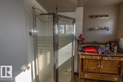 Full bath featuring a stall shower - 11126 Twp Rd 605A, Rural St. Paul County, AB - Indoor Photo Showing Other Room