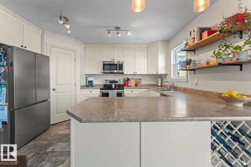 1453 Wildrye Crescent, Cold Lake, AB - Indoor Photo Showing Kitchen With Stainless Steel Kitchen With Double Sink