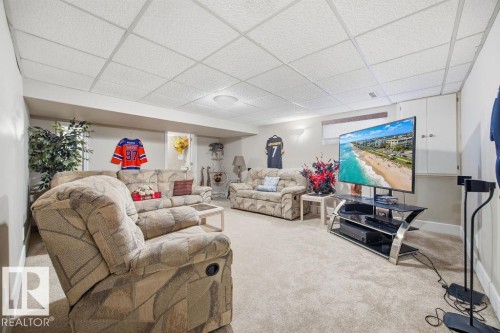 Living area with carpet floors and a drop ceiling - 3011 44A Street, Edmonton, AB - Indoor