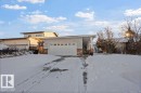 View of front facade featuring a garage and brick siding - 3011 44A Street, Edmonton, AB  - Outdoor 